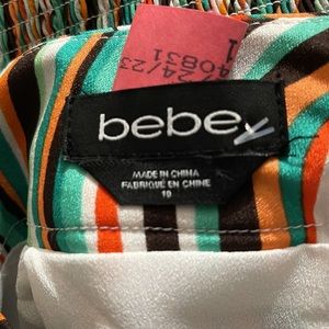 Bebe Top and Bottom with a slit on the back Size 10